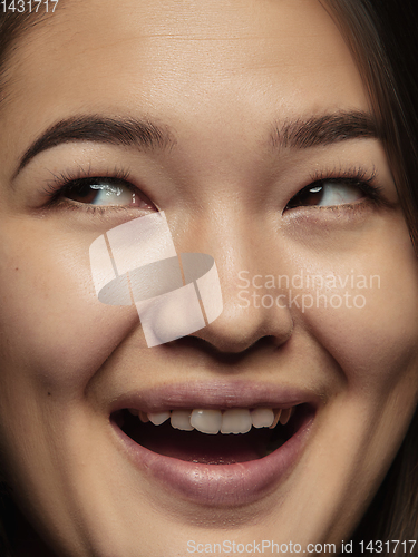 Image of Close up portrait of young emotional woman