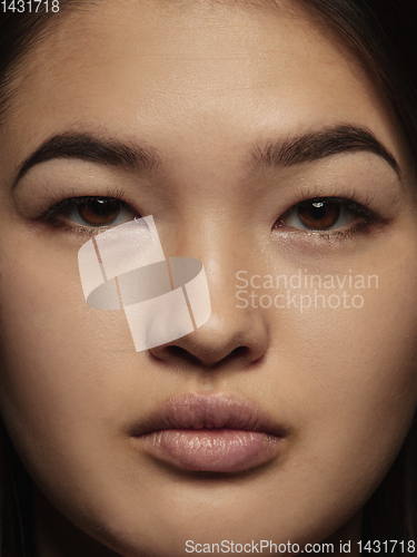 Image of Close up portrait of young emotional woman