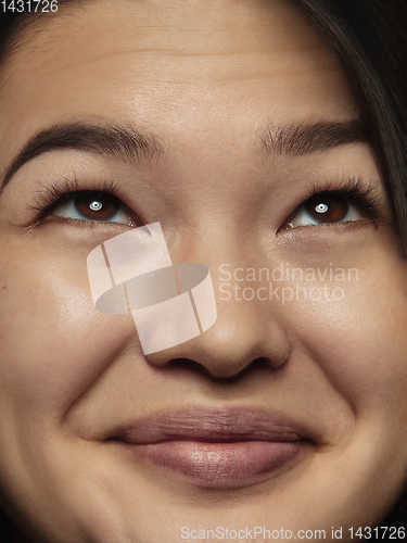 Image of Close up portrait of young emotional woman