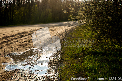 Image of Puddles on the country road in Latvia.