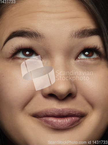 Image of Close up portrait of young emotional woman