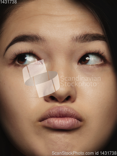 Image of Close up portrait of young emotional woman