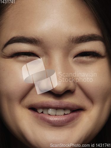 Image of Close up portrait of young emotional woman