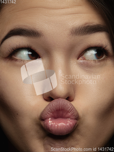 Image of Close up portrait of young emotional woman