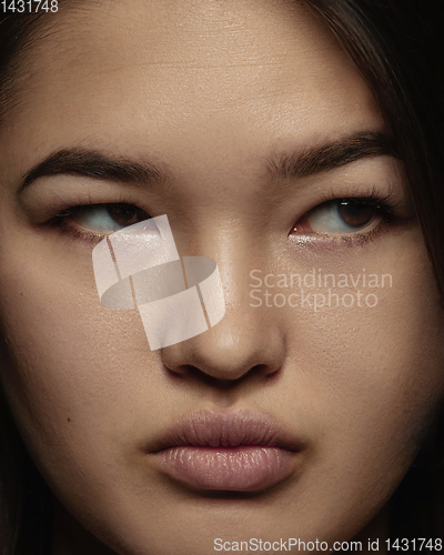 Image of Close up portrait of young emotional woman