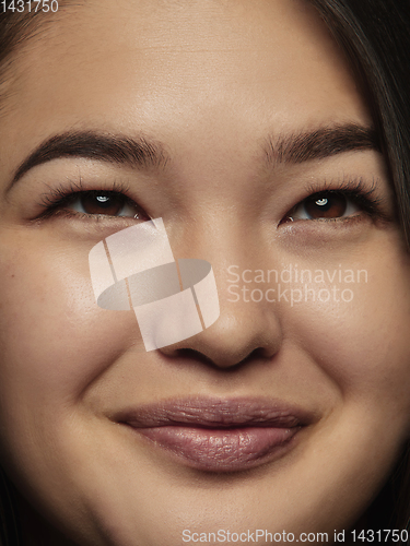 Image of Close up portrait of young emotional woman