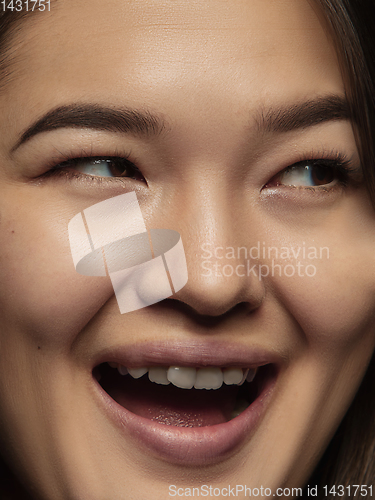 Image of Close up portrait of young emotional woman