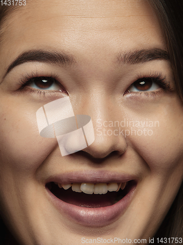 Image of Close up portrait of young emotional woman