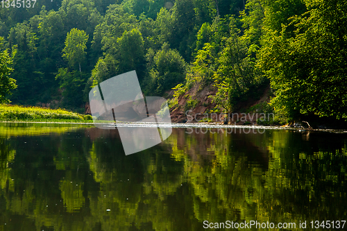 Image of Landscape with river, cliff  and forest in Latvia.