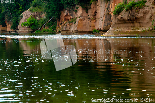 Image of Red sandstone cliff on coast of the river 