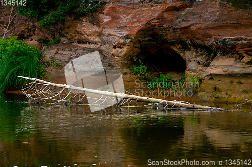 Image of Red sandstone cliff on coast of the river 