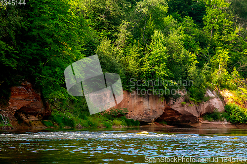 Image of Red sandstone cliff on coast of the river 