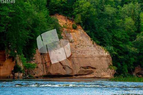 Image of Red sandstone cliff on coast of the river 