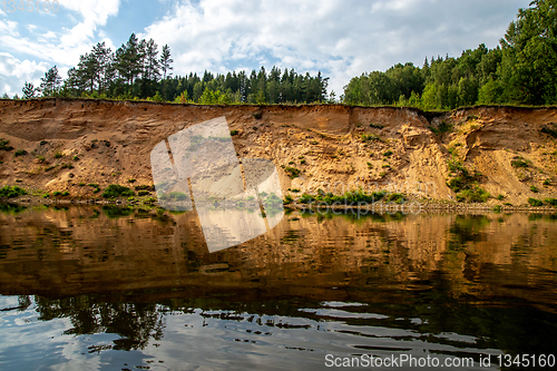 Image of Landscape with river, and trees on the cliff in Latvia.