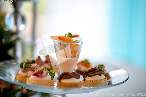Image of Shrimp salad and sandwiches on plate.