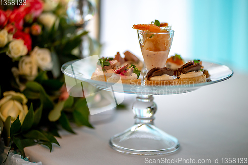 Image of Shrimp salad and sandwiches on plate.