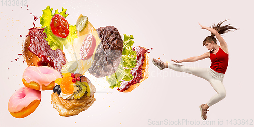 Image of Burger\'s crashing by the boxer isolated on white background