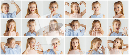 Image of Little smiling girl posing on white background, creative collage