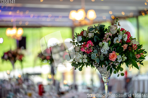 Image of Wedding table decorated with flowers 