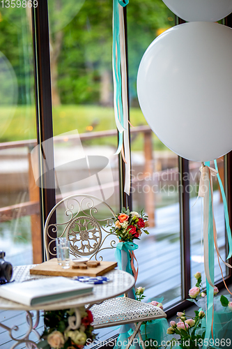 Image of Room decorated for wedding party in restaurant