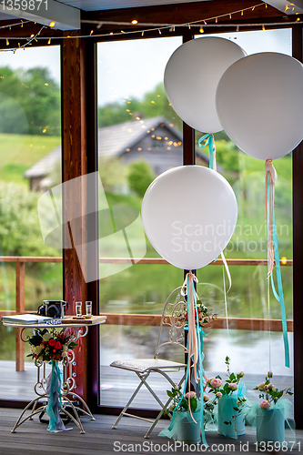 Image of Room decorated for wedding party in restaurant