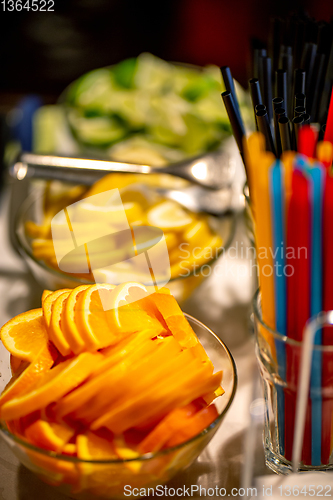 Image of Orange, lemon and lime slices on the wedding table