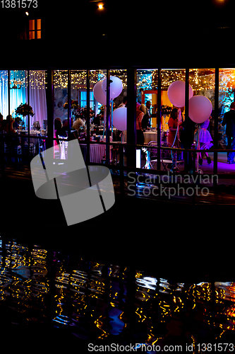 Image of Wedding celebrations at night with spotlights