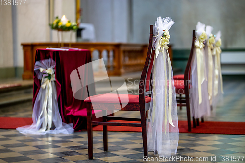 Image of Church decorated for wedding ceremony