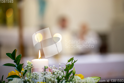 Image of Bouquet of flowers and candle