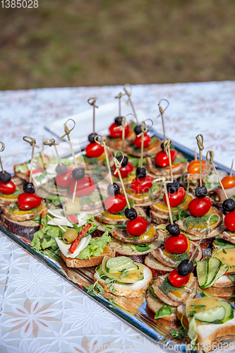 Image of Wedding table with canapes and sandwiches