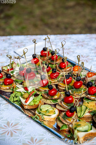 Image of Wedding table with canapes and sandwiches