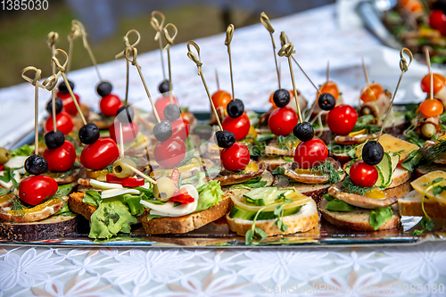 Image of Wedding table with canapes and sandwiches