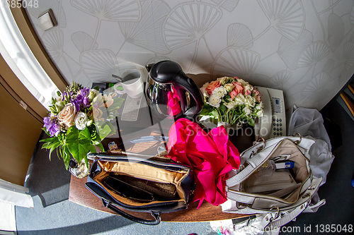 Image of Lady's accessories on table in bridal room