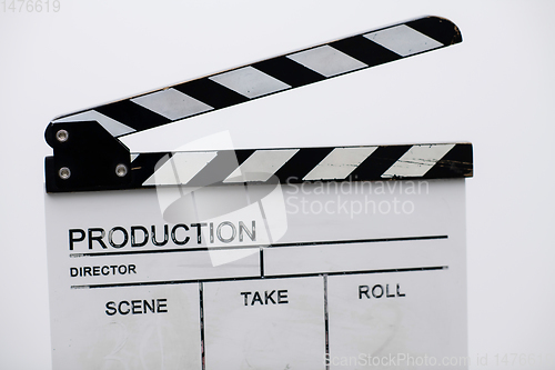 Image of movie clapper on white background