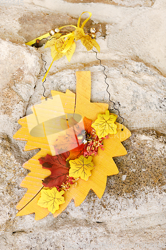 Image of Autumn still life decoration over stone background