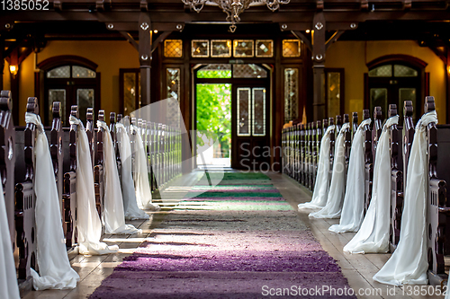 Image of Church decorated for wedding ceremony