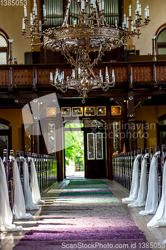 Image of Church decorated for wedding ceremony