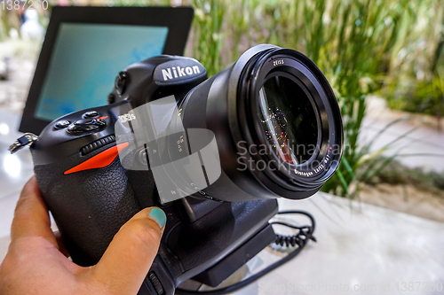 Image of Photo camera Nikon with Zeiss lens