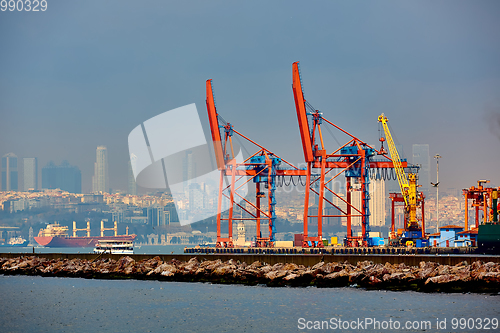 Image of Logistics and transportation of Container Cargo ship and Cargo plane with working crane bridge in shipyard, logistic import export and transport industry background