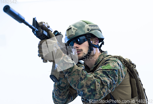 Image of soldier aiming laseer sight optics white background