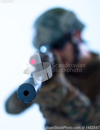 Image of soldier aiming laseer sight optics white background