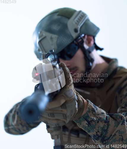 Image of soldier aiming laseer sight optics white background