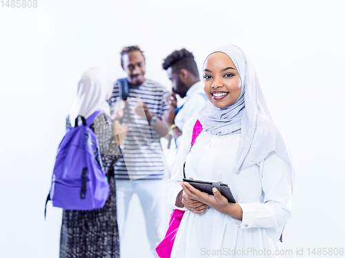 Image of muslim female student with group of friends