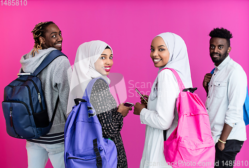 Image of african students group using smart phones