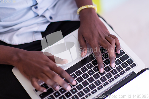 Image of African student using laptop computer