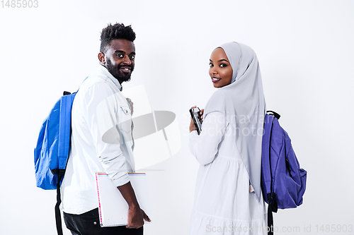 Image of african students couple walking