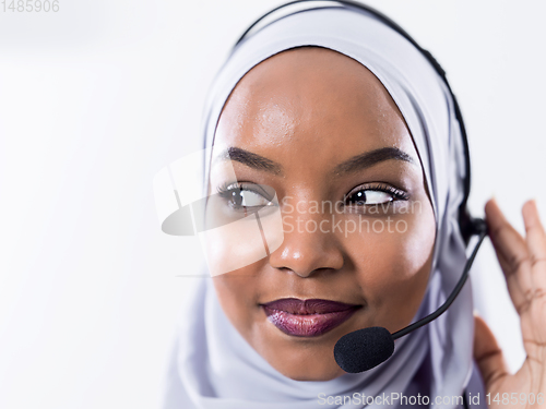 Image of african customer representative business woman with phone headse