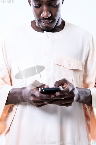 Image of african man using smartphone