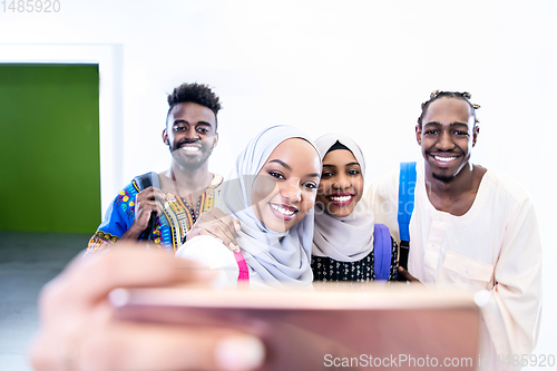 Image of african students group taking a selfie