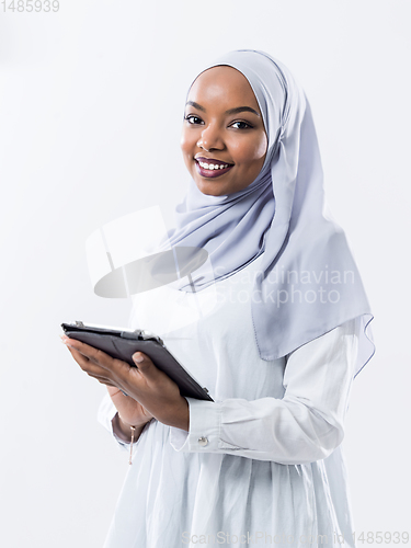 Image of african business woman using tablet computer